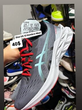 ASICS Gray Running Shoe with Teal Logo and Red Laces